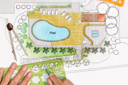 Hand-drawn landscape plan featuring pool, spa, and large wraparound deck with lounge areas.