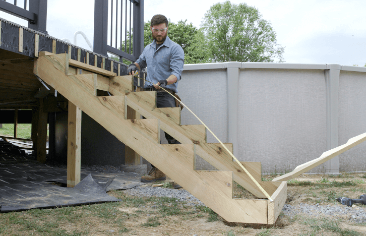 Image Person Installing Deck Stairs