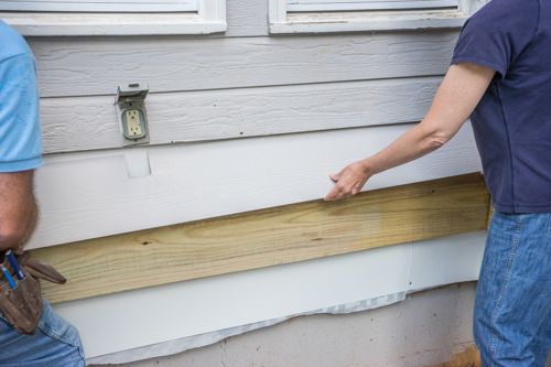 Carefully slip in the siding