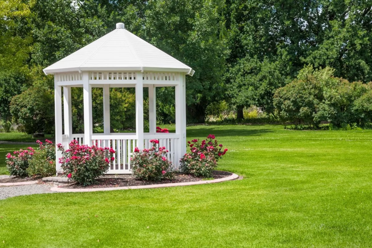 Wooden Gazebo Among Roses