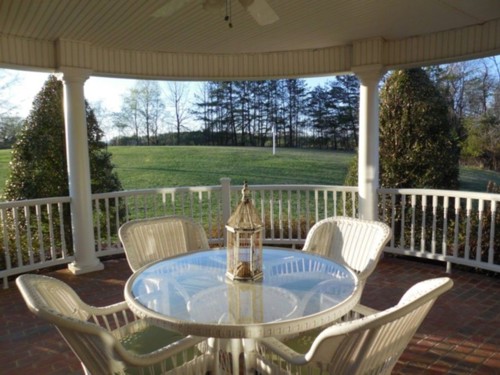 Matching patio furniture with brass lamp