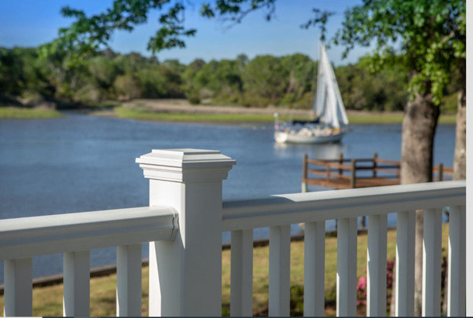 Deck Railing With Lake In The Background