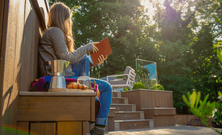 Image Person Reading On Multi Color Composite Deck 2X