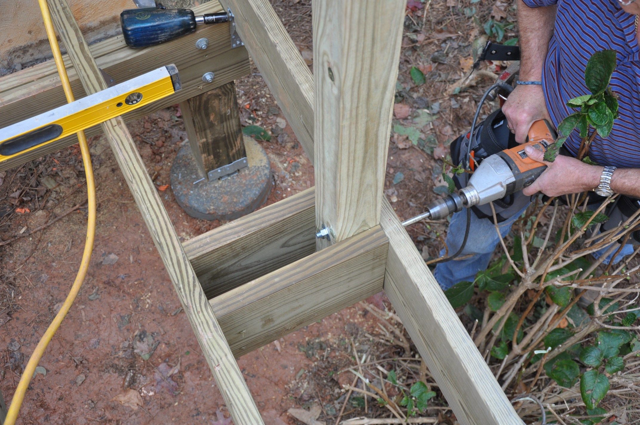 Stiffen the rail with blocking.