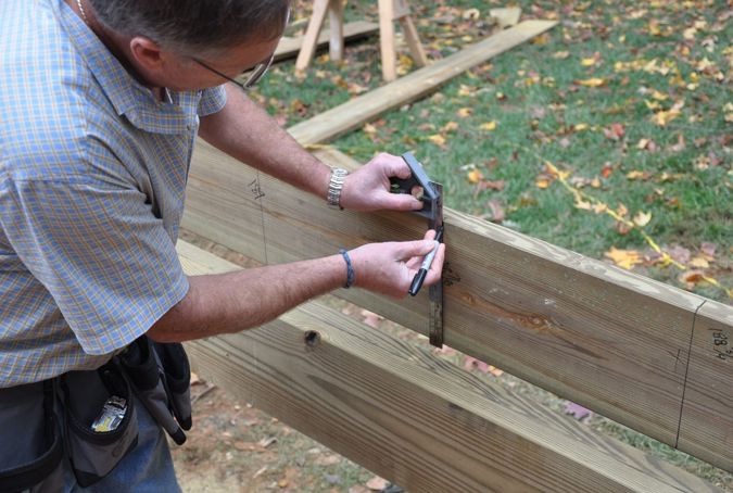 Use a sharpie or construction pencil to mark your joists.