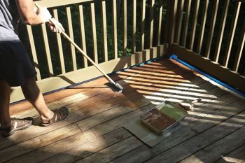 Use a long handled car wash push brush.