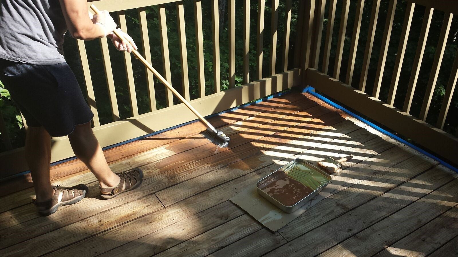 Use a long handled car wash push brush.