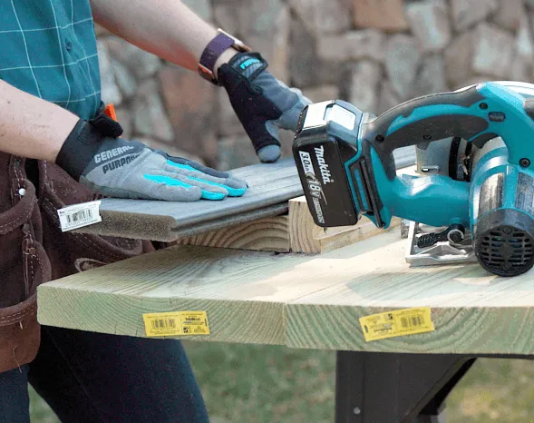 Image Person Cutting Composite Deck Boards