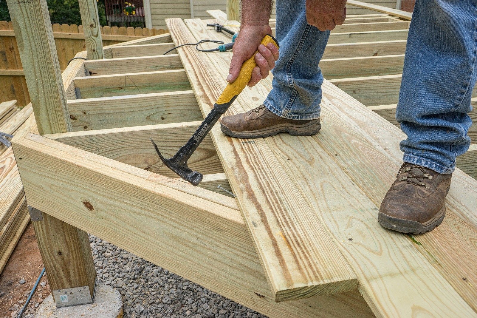 Straighten a board with a toenail.