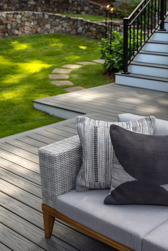 Image of pillows on furniture on a deck