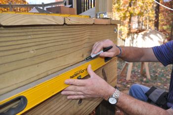 Use a level to mark the top step.