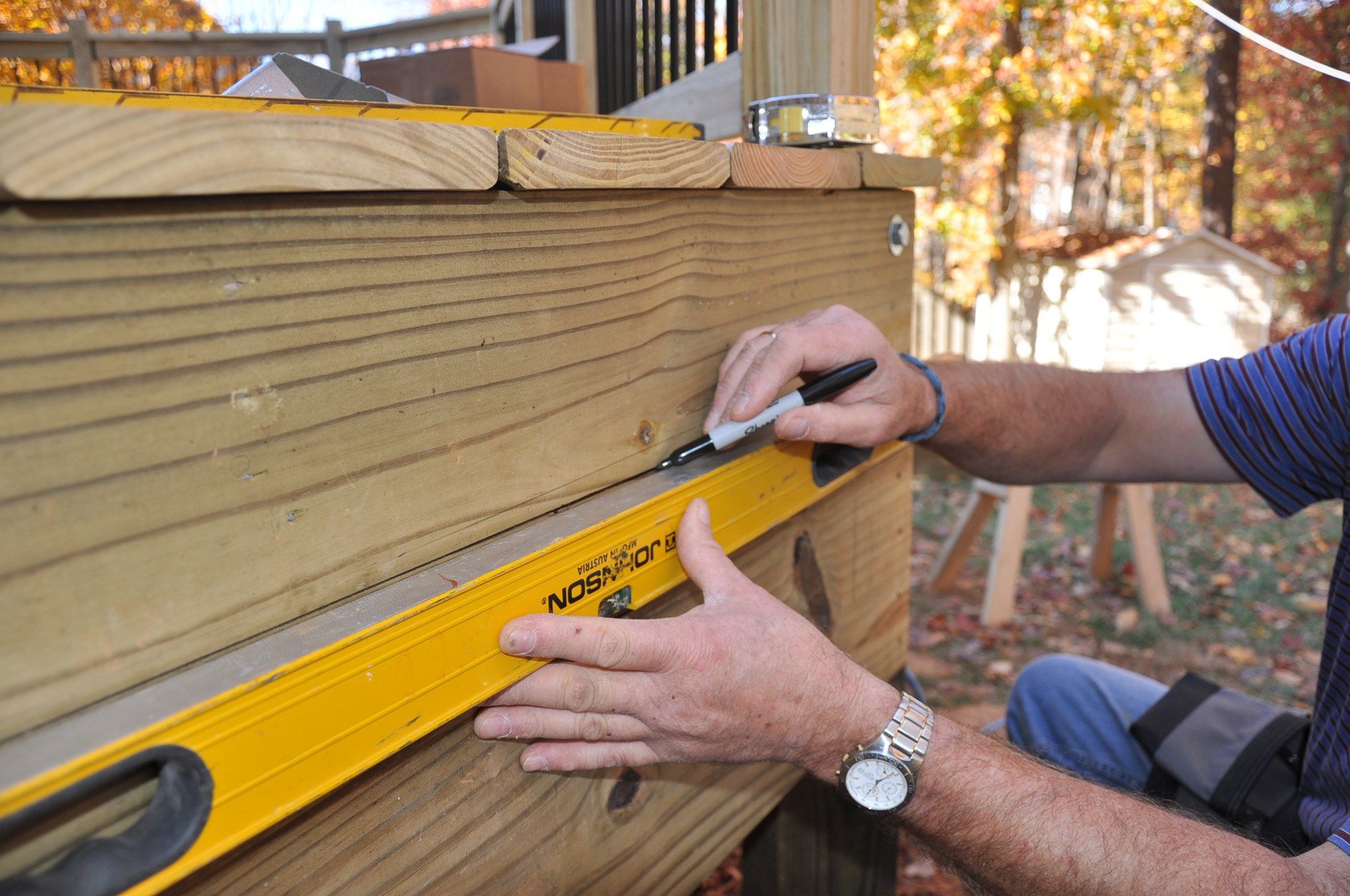 Use a level to mark the top step.