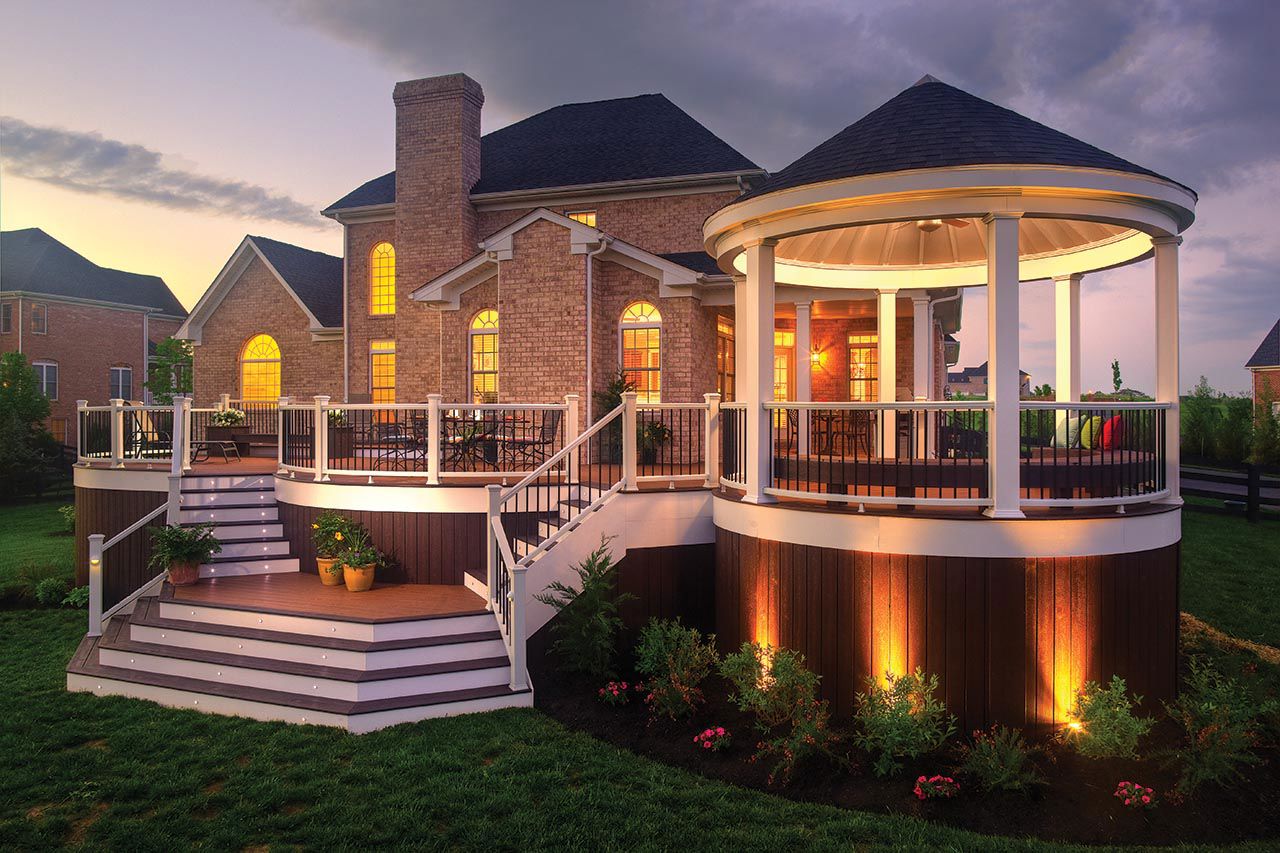 Brick House Lighting With Pergola