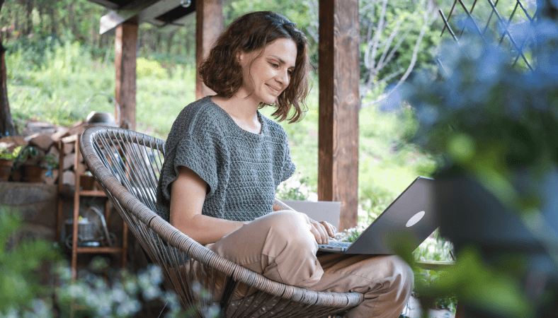 Image Person On Computer In Backyard Looking At Decking Calculators 2X
