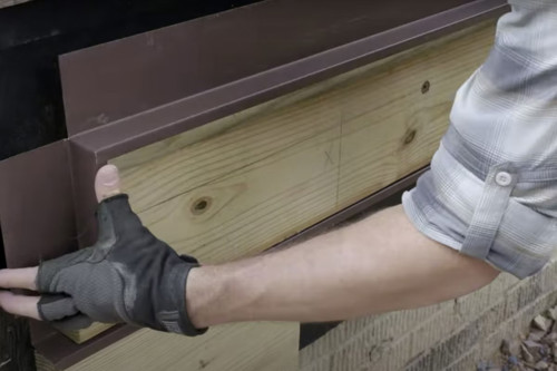 Man Installing Flashing