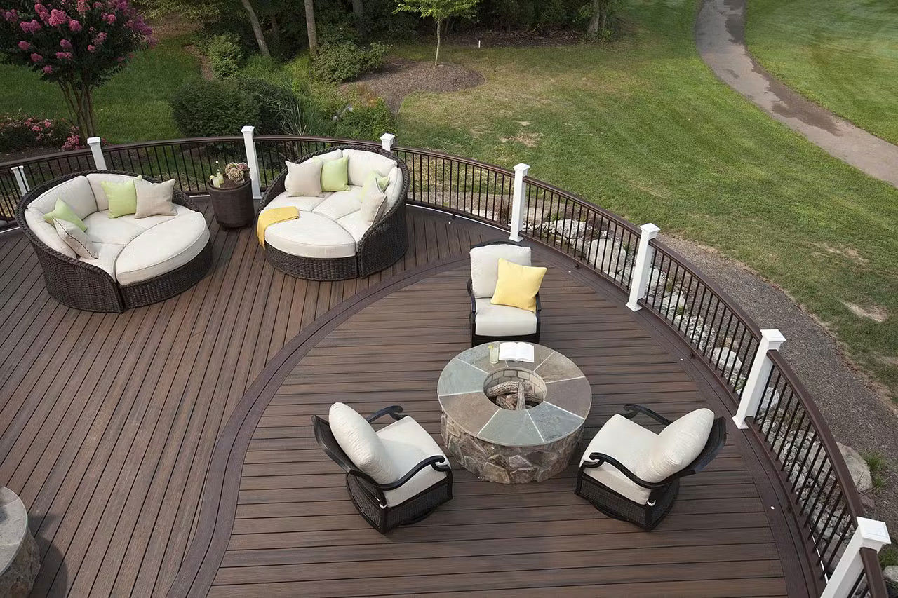 Aerial View Of A Round Deck With Chairs And A Fire Pit